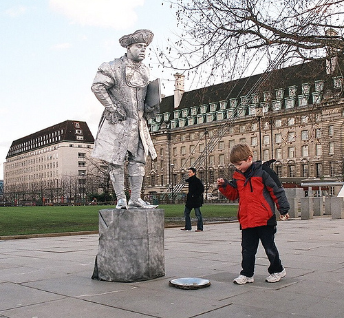 Street Performer Gets A Tip, Photo by ceajaegirl, cc-by license)